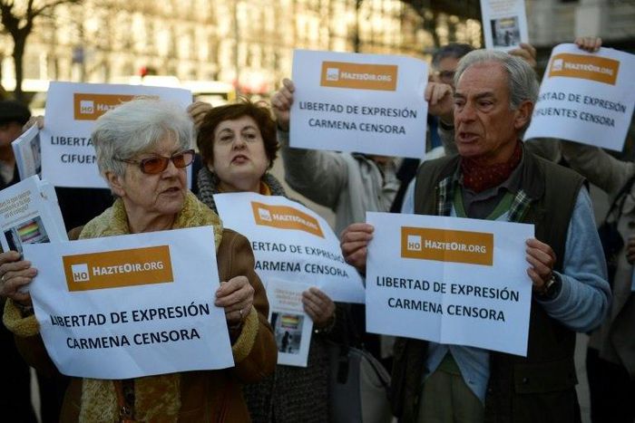 Members of the "HazteOir" ("Make yourself heard") association protest in Madrid on March 1, 2017 against the immobilisation by the police of their anti-transgender propaganda bus