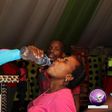 Prophet Light Monyeki of Grace Living Hope Ministries gives a congregant some poison