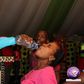 Prophet Light Monyeki of Grace Living Hope Ministries gives a congregant some poison