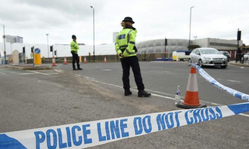 A police cordon surrounds Manchester Arena following a deadly terror attack