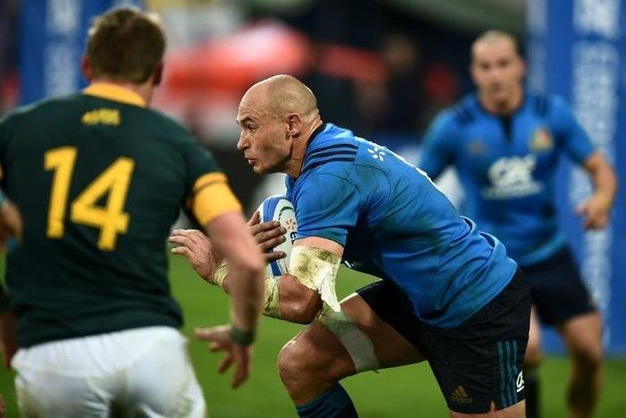 Italy will be without influential skipper and No 8 Sergio Parisse (C), banned for three weeks, against Tonga
