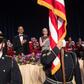 US President Barack Obama (C), First Lady Michelle Obama (L), and White House Correpondents' Association president Carol Lee (R) attend the 102nd White House Correspondents' Association Dinner in Washington, DC, in 2016