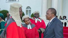 President Uhuru Kenyatta with Chief Justice David Maraga and deputy CJ Philomena Mwilu at State House