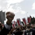 Greek trade unions mark May Day with a 24-hour nationwide strike and protests against looming new cuts
