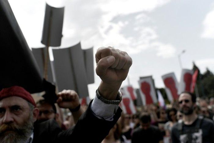 Greek trade unions mark May Day with a 24-hour nationwide strike and protests against looming new cuts
