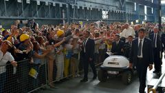 Pope Francis received a rapturous reception from workers at a steel plant in Genoa, where he warned against the dangers of financial speculation and a "faceless" economy which discards workers' interests