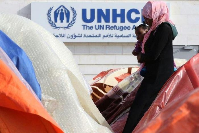 Armed men have abducted three UN refugee agency staffers, from Sudan's strife-torn Darfur region, an official says