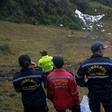 Rescuers look at the wreckage of the LAMIA Airlines charter plane that carried members of the Chapecoense Real football team, in the mountains of Cerro Gordo in Colombia, on November 29, 2016