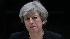 Britain's Prime Minister Theresa May delivers a statement in response to a deadly suicide bombing in Manchester on May 23, 2017 in London