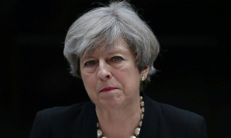 Britain's Prime Minister Theresa May delivers a statement in response to a deadly suicide bombing in Manchester on May 23, 2017 in London