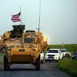 US forces accompanied by Kurdish People's Protection Units fighters patrol the Syria-Turkey border late last month
