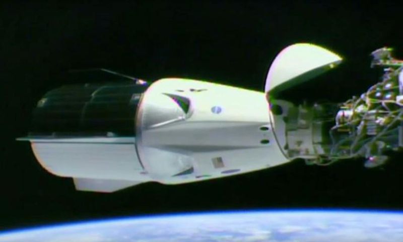 This video grab taken from the NASA/SpaceX webcast transmission on March 3, 2019, shows a SpaceX Falcon 9 rocket docked with the International Space Station (ISS) during the Demo-1 mission