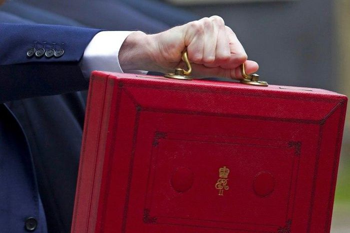 Britain's annual budget is traditionally carried in a famous red leather briefcase