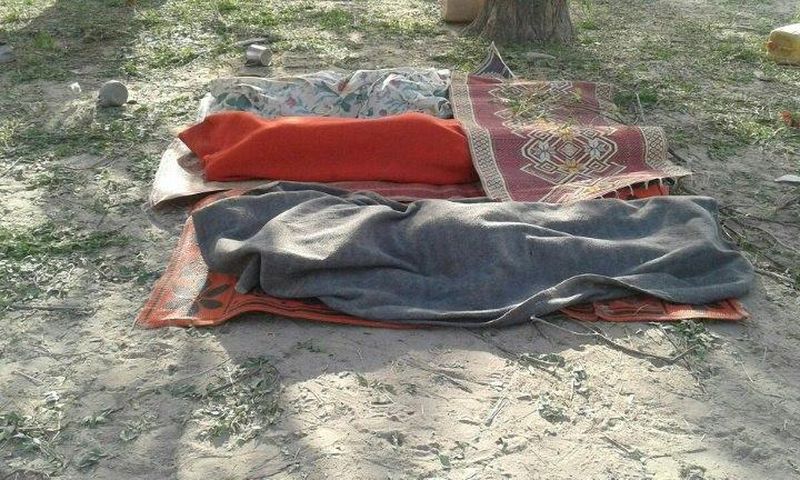 Bodies covered with blankets are pictured in Rann, northeast Nigeria on January 17, 2017 after an an air force jet accidentally bombarded a camp for displaced people