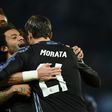 Real Madrid's Alvaro Morata (R) celebrates a goal with teammates at the end of their UEFA Champions League football match agaisnt Granada on March 7, 2017 at the San Paolo stadium in Naples