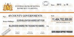 Cheque handed over by President Uhuru Kenyatta during the 6th annual Devolution Conference (Twitter)