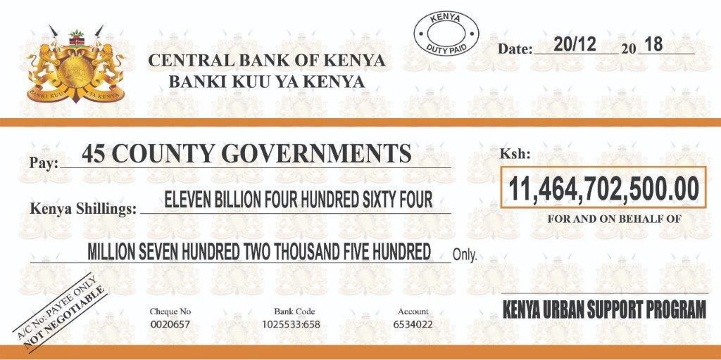 Cheque handed over by President Uhuru Kenyatta during the 6th annual Devolution Conference (Twitter)