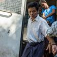 Tun Naing (left) arrives at a Yangon court compound on November 18, 2016