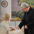 Armenian President Serzh Sarkisian casts his ballot in elections observers say were marred by allegations of fraud