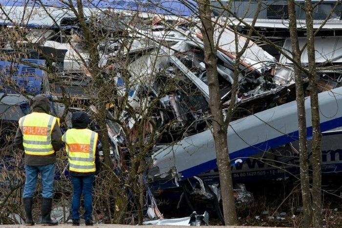 German police inspect the site of a train accident near Bad Aibling in February 2016
