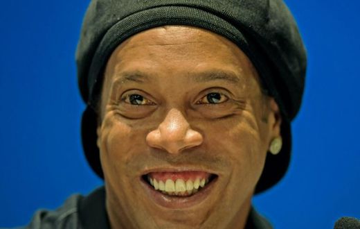 Former FC Barcelona and Brazil national Ronaldinho -- a supporter of right-wing President Jair Bolsonaro -- decries corruption in a rap duet video released on YouTube