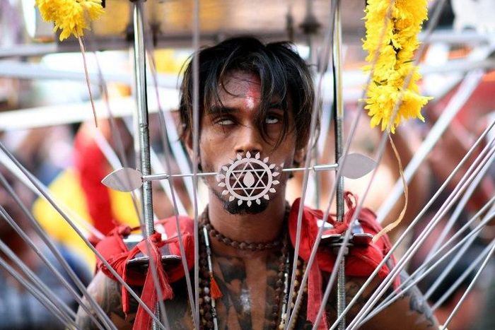 A Malaysian Hindu devotee walks in a trance towards the Batu caves temple during the Thaipusam festival celebrations in Kuala Lumpur