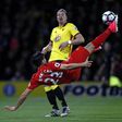 Liverpool's midfielder Emre Can connects with this overhead kick to open the scoring in the English Premier League football match against Watford at Vicarage Road Stadium in Watford, north of London on May 1, 2017