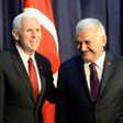 US Vice President Michael Richard Pence (L) and Turkish Prime Minister Binali Yildirim pose for photographers ahead talks at the Munich Security Conference