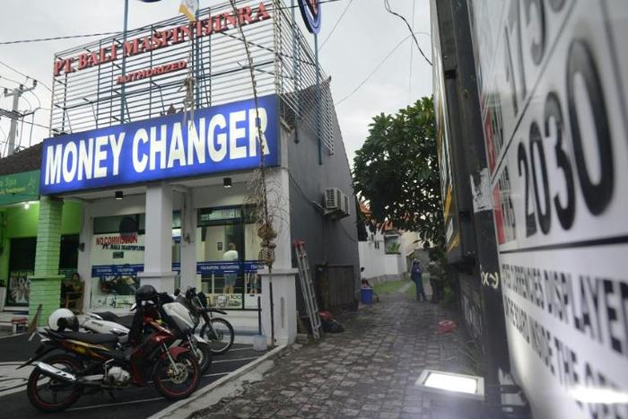 Employees at this Bali money exchange were beaten and tied up in the violent robbery