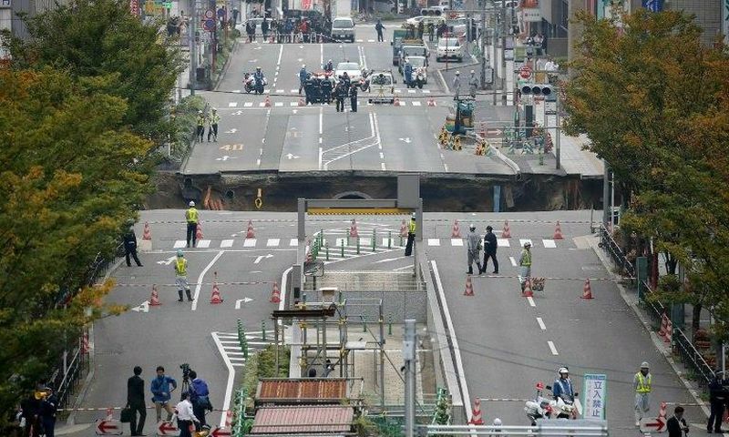 A giant sinkhole appeared on a five-lane boulevard in central Fukoka, southwestern Japan, on November 8, 2016