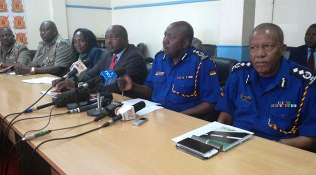 Police Spokesman Charles Owino with NTSA boss Francis Mejja during a press briefing on Wednesday