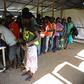 Newly arrived refugees from South Sudan queue to be registered at Kuluba Reception Centre, north of the Ugandan capital Kampala