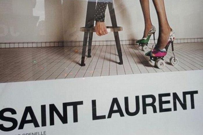 Yves Saint Laurent have been accused of 'degrading' models and 'inciting rape' with a new French advertising campaign. One image (above) shows a model in a leotard and roller skate stilettos bending over a stool