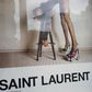 Yves Saint Laurent have been accused of 'degrading' models and 'inciting rape' with a new French advertising campaign. One image (above) shows a model in a leotard and roller skate stilettos bending over a stool