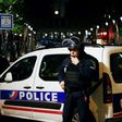 A French Police officer stands guard in front of the North station in Paris, on late May 8, 2017, during a police operation following an evacuation due to a security alert