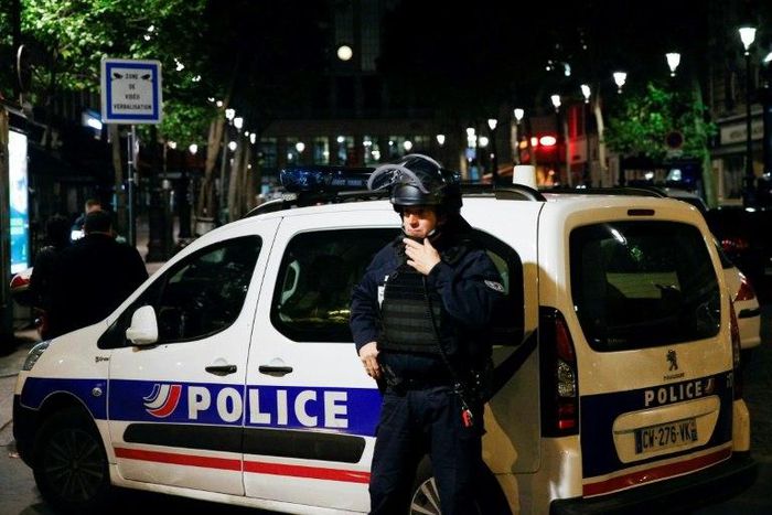 A French Police officer stands guard in front of the North station in Paris, on late May 8, 2017, during a police operation following an evacuation due to a security alert
