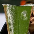 Manchester United manager Jose Mourinho kisses the trophy after his side beat Ajax in Stockholm to win the Europa League on May 24, 2017