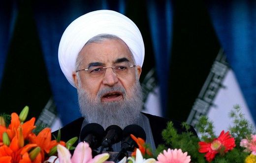 Iranian President Hassan Rouhani delivers a speech during a parade on the occasion of the country's Army Day, on April 18, 2017, in Tehran