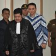 Jakarta's Christian governor Basuki Tjahaja Purnama (2nd R), popularly known as Ahok, arrives at a courtroom for a verdict and sentence in his blasphemy trial