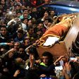 Mourners carry the coffin of Omar Abdel Rahman during his funeral in the village of Jamalia, in the Egyptian province of Dakahlia, on February 22, 2017