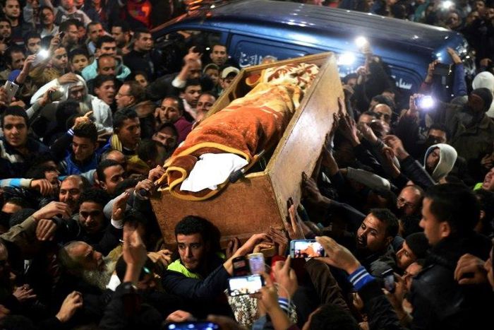 Mourners carry the coffin of Omar Abdel Rahman during his funeral in the village of Jamalia, in the Egyptian province of Dakahlia, on February 22, 2017