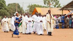 Priests of the Very Holy Church of Jesus Christ of Baname arrive at the Nazareth church in Djidja