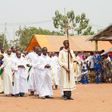 Priests of the Very Holy Church of Jesus Christ of Baname arrive at the Nazareth church in Djidja