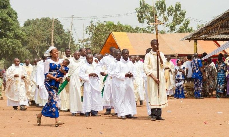 Priests of the Very Holy Church of Jesus Christ of Baname arrive at the Nazareth church in Djidja