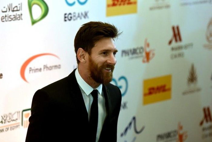 Barcelona's striker Lionel Messi arrives for a press conference in Cairo's northern Giza district on February 21, 2017