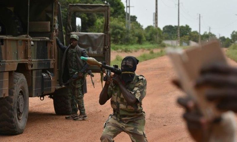 A mutinous soldier holds a RPG rocket launcher inside a military camp in the Ivory Coast's central second city Bouake, on May 15, 2017