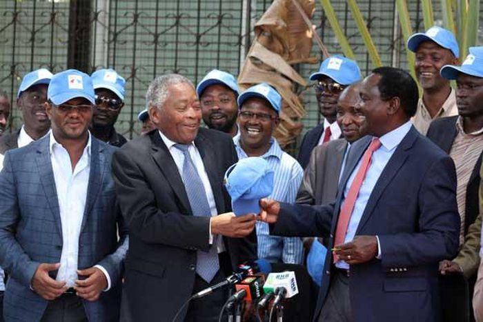Wiper leader Kalonzo Musyoka (right) received Kwale gubernatorial Aspirant Chirau Ali Mwakwere at the party’s headquarters in Lavington, Nairobi, on March 2, 2017.