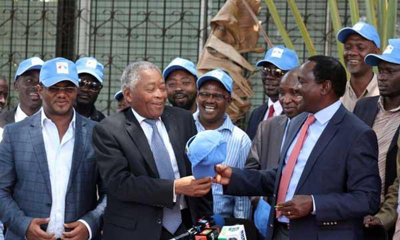 Wiper leader Kalonzo Musyoka (right) received Kwale gubernatorial Aspirant Chirau Ali Mwakwere at the party’s headquarters in Lavington, Nairobi, on March 2, 2017.