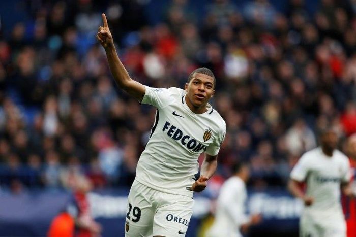 Monaco's forward Kylian Mbappe celebrates after scoring a goal against Caen on March 19, 2017 at the Michel d'Ornano stadium, in Caen, northwestern France