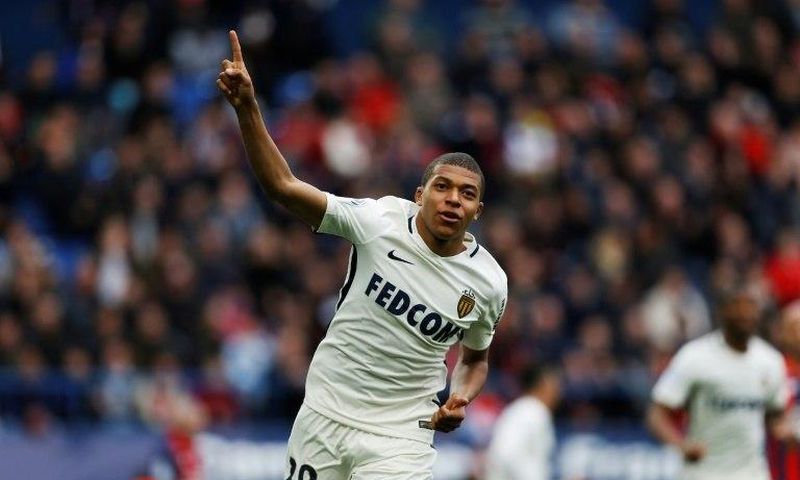 Monaco's forward Kylian Mbappe celebrates after scoring a goal against Caen on March 19, 2017 at the Michel d'Ornano stadium, in Caen, northwestern France